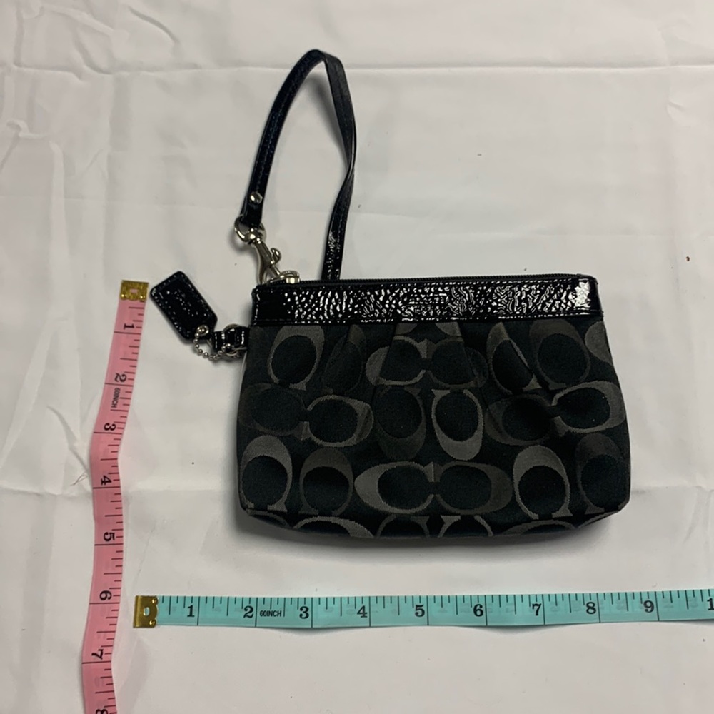 Coach wristlet in signature print